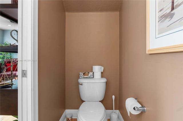 7702 Paddock Pl, Davie, FL 33328 - bathroom with toilet and baseboards