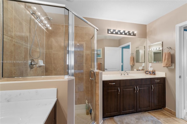 7702 Paddock Pl, Davie, FL 33328 - full bathroom featuring vanity, a shower stall, and tile patterned floors