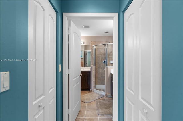 7702 Paddock Pl, Davie, FL 33328 - hall featuring a sink and light tile patterned floors