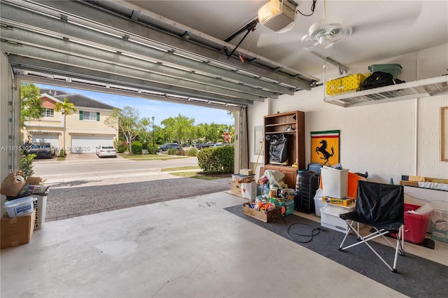 7702 Paddock Pl, Davie, FL 33328 - garage featuring a garage door opener