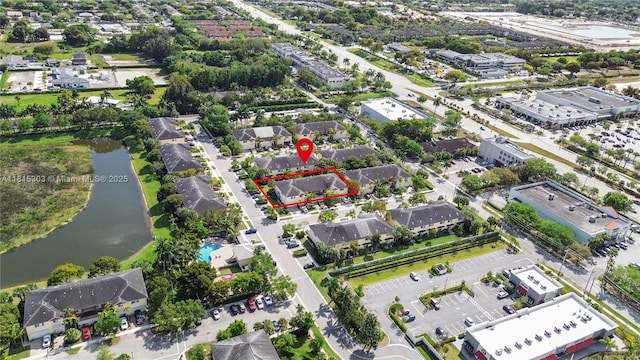 7702 Paddock Pl, Davie, FL 33328 - aerial overview of property's location with a large body of water and property parcel outlined