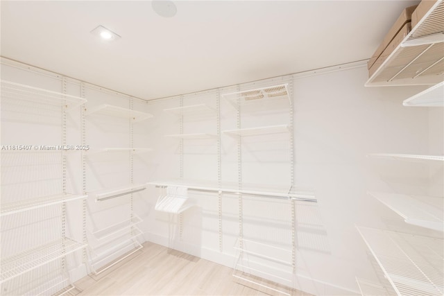 181 Crandon Blvd Unit 306, Key Biscayne, FL 33149 - spacious closet with wood finished floors