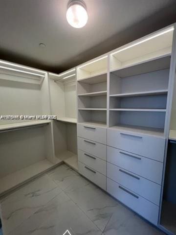 16385 Biscayne Blvd Unit 820, North Miami Beach, FL 33160 - walk in closet with light marble finish floors