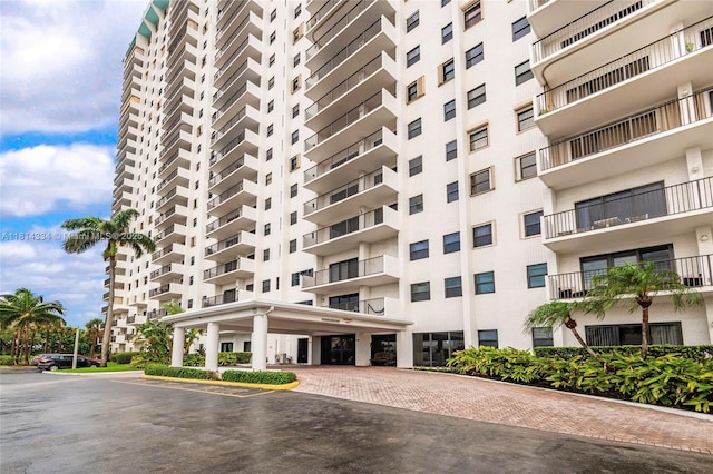1201 S Ocean Dr Unit 610N, Hollywood, FL 33019 - view of apartment building / complex featuring covered parking
