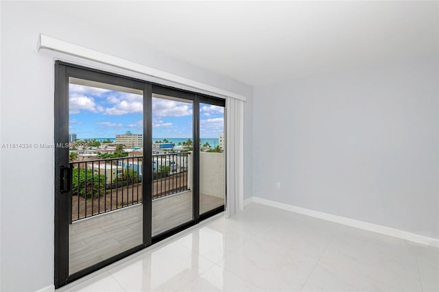 1201 S Ocean Dr Unit 610N, Hollywood, FL 33019 - unfurnished room featuring baseboards and a water view
