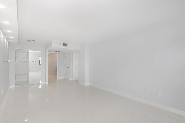 1201 S Ocean Dr Unit 610N, Hollywood, FL 33019 - unfurnished room with baseboards, recessed lighting, and light marble finish floors