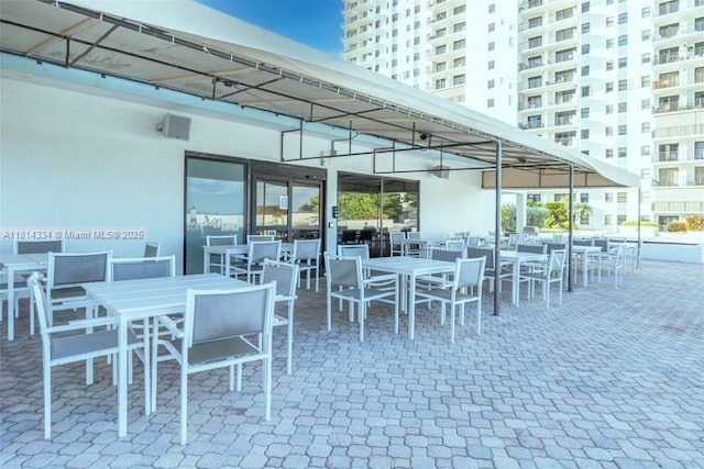 1201 S Ocean Dr Unit 610N, Hollywood, FL 33019 - view of patio / terrace with outdoor dining area