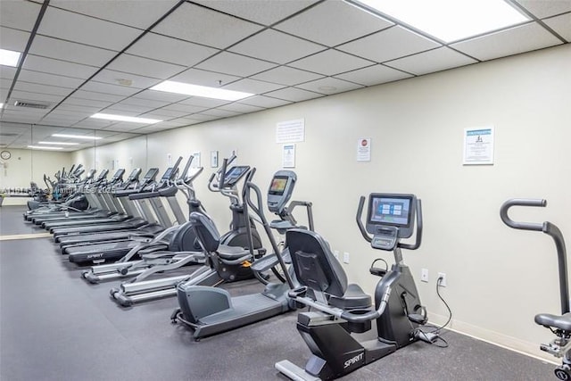 1201 S Ocean Dr Unit 610N, Hollywood, FL 33019 - exercise room featuring a paneled ceiling and baseboards