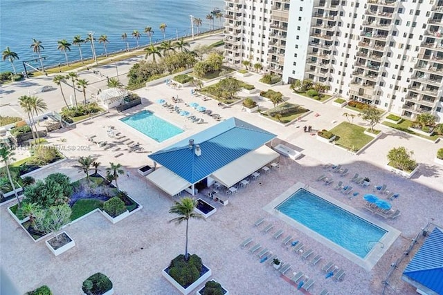1201 S Ocean Dr Unit 610N, Hollywood, FL 33019 - drone / aerial view of a pool, apartment complex, and a large body of water