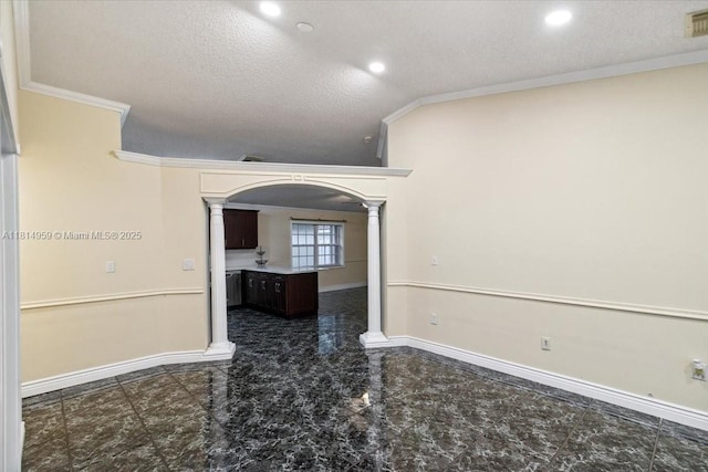 17610 SW 4th Ct, Pembroke Pines, FL 33029 - spare room featuring ornate columns, crown molding, arched walkways, a textured ceiling, and baseboards