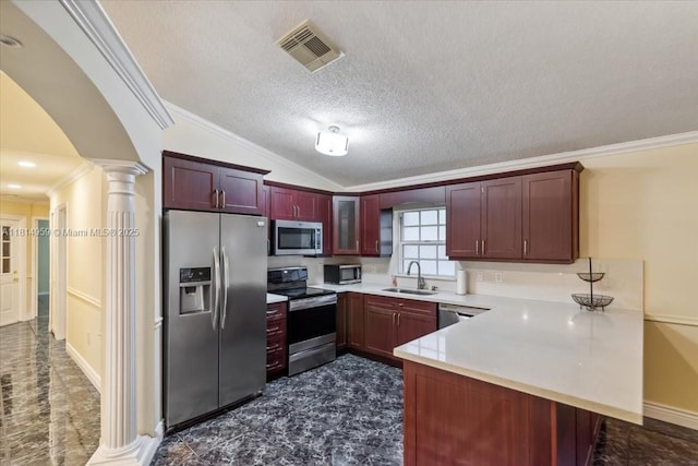 17610 SW 4th Ct, Pembroke Pines, FL 33029 - kitchen with appliances with stainless steel finishes, a sink, crown molding, ornate columns, and a peninsula