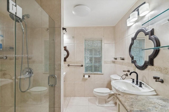 17610 SW 4th Ct, Pembroke Pines, FL 33029 - full bath featuring toilet, tile walls, a shower stall, vanity, and tile patterned flooring