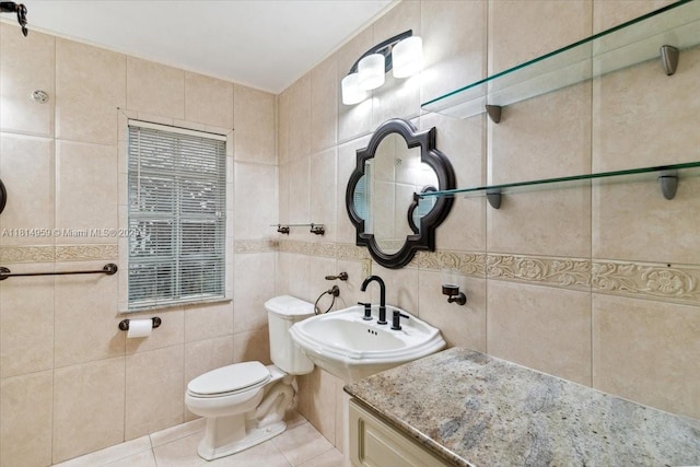 17610 SW 4th Ct, Pembroke Pines, FL 33029 - bathroom with tile walls, tile patterned flooring, toilet, a sink, and backsplash