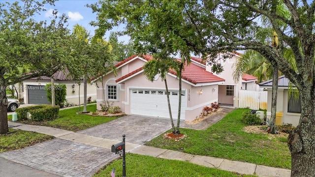 17610 SW 4th Ct, Pembroke Pines, FL 33029 - view of front of house featuring a tiled roof, decorative driveway, a garage, and stucco siding