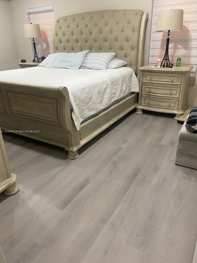 16365 SW 47th Ter, Ocala, FL 34473 - bedroom featuring wood finished floors
