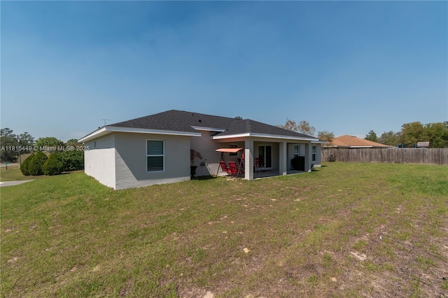 16365 SW 47th Ter, Ocala, FL 34473 - back of property featuring stucco siding and a patio area