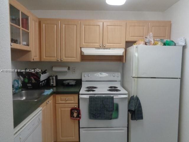 9320 Fontainebleau Blvd Unit 503, Miami, FL 33172 - kitchen with white appliances, extractor fan, light brown cabinets, a sink, and glass insert cabinets