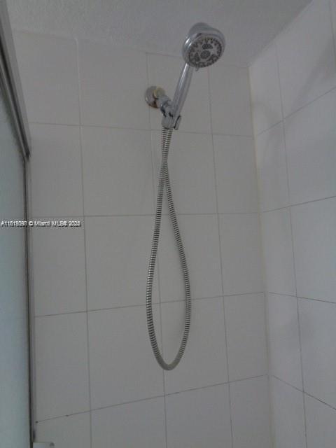 9320 Fontainebleau Blvd Unit 503, Miami, FL 33172 - bathroom view of a tile shower