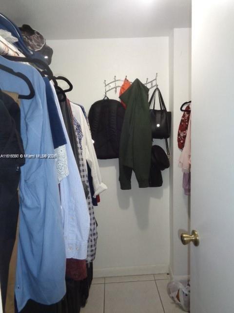 9320 Fontainebleau Blvd Unit 503, Miami, FL 33172 - spacious closet with tile patterned floors