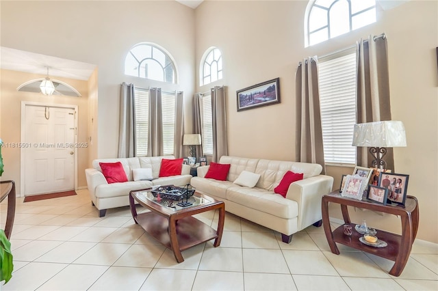 15683 NW 12th Rd, Pembroke Pines, FL 33028 - living room featuring a high ceiling, plenty of natural light, and tile patterned floors