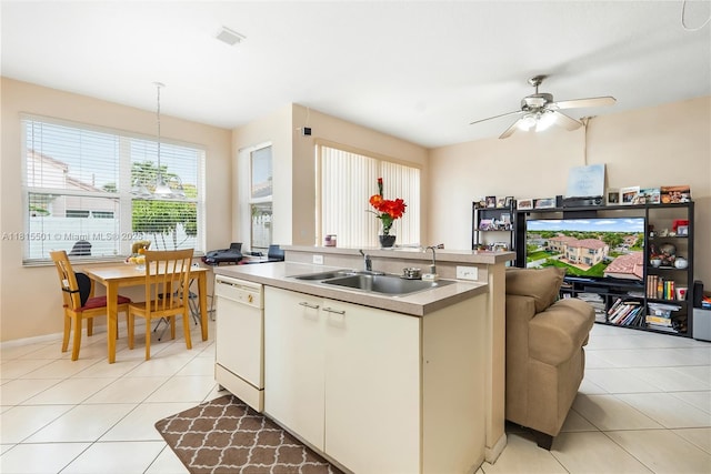 15683 NW 12th Rd, Pembroke Pines, FL 33028 - kitchen with dishwasher, a kitchen island with sink, light tile patterned flooring, ceiling fan, and light countertops