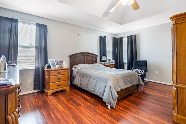 15683 NW 12th Rd, Pembroke Pines, FL 33028 - bedroom with multiple windows, dark wood-type flooring, baseboards, and a ceiling fan