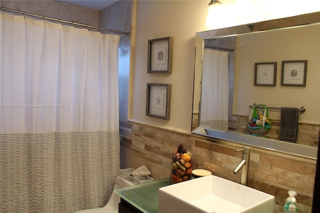 9941 SW 97th Ct, Miami, FL 33176 - bathroom featuring vanity, a shower with shower curtain, wainscoting, and toilet