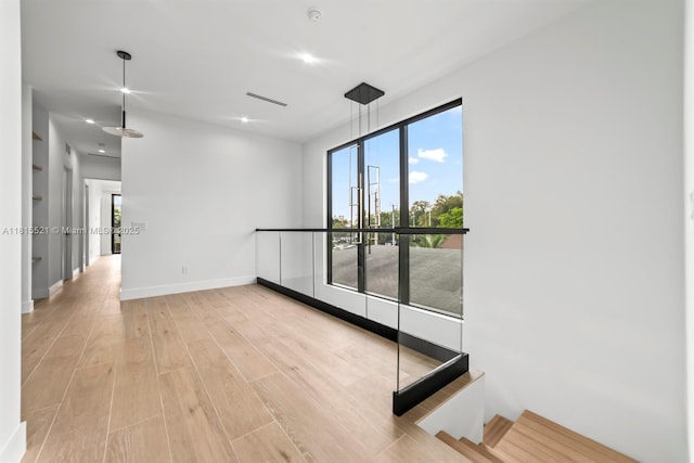 1812 Miami Rd, Fort Lauderdale, FL 33316 - unfurnished room with healthy amount of natural light, light wood-style flooring, baseboards, and recessed lighting
