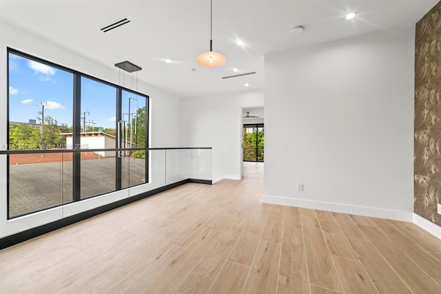 1812 Miami Rd, Fort Lauderdale, FL 33316 - spare room featuring wood finished floors, baseboards, and recessed lighting
