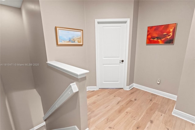 3063 NW 126th Ave, Sunrise, FL 33323 - corridor with light wood-type flooring and baseboards