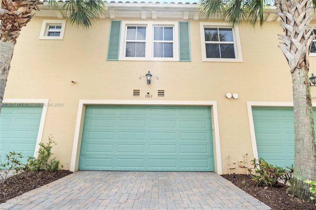 3063 NW 126th Ave, Sunrise, FL 33323 - view of front facade featuring stucco siding and an attached garage