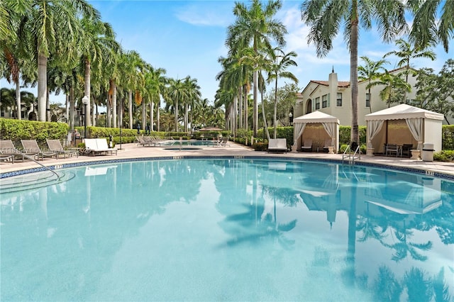 3063 NW 126th Ave, Sunrise, FL 33323 - community pool featuring a gazebo and a patio area