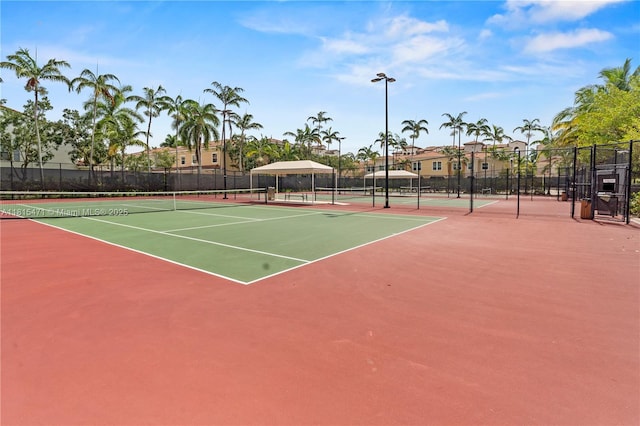 3063 NW 126th Ave, Sunrise, FL 33323 - view of tennis court featuring community basketball court