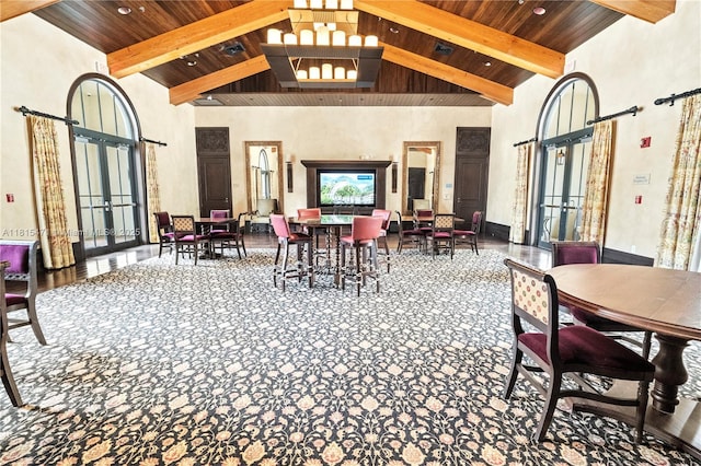 3063 NW 126th Ave, Sunrise, FL 33323 - dining space featuring french doors, a wooden ceiling with exposed beams, high vaulted ceiling, recessed lighting, and a barn door