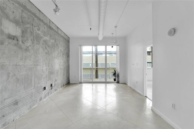 2001 Biscayne Blvd Unit 2305, Miami, FL 33137 - tiled empty room featuring baseboards
