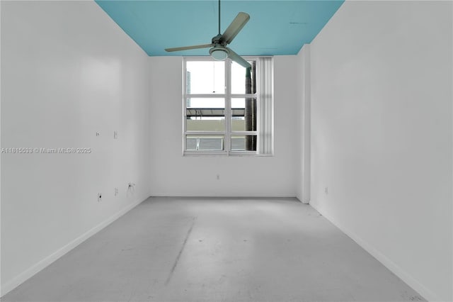 2001 Biscayne Blvd Unit 2305, Miami, FL 33137 - spare room with finished concrete floors, a ceiling fan, and baseboards
