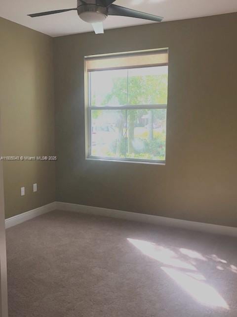 3311 NW 125th Ln, Sunrise, FL 33323 - carpeted spare room featuring ceiling fan and baseboards