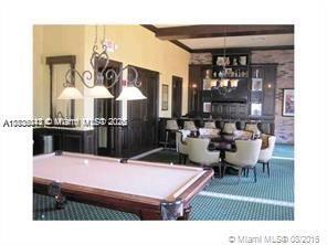 3311 NW 125th Ln, Sunrise, FL 33323 - rec room with a chandelier, beam ceiling, and billiards