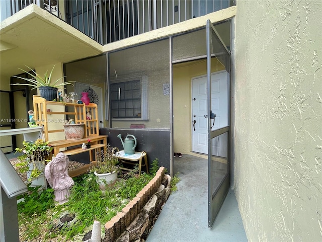 1150 N Liberty Ave Unit K, Homestead, FL 33034 - entrance to property featuring stucco siding and a balcony