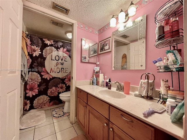 1150 N Liberty Ave Unit K, Homestead, FL 33034 - full bathroom with vanity, tile patterned flooring, toilet, a textured ceiling, and a shower with shower curtain