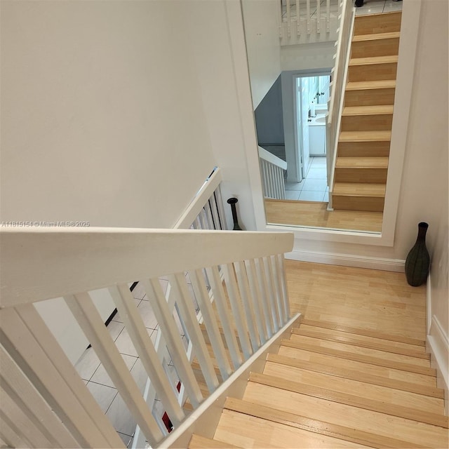 7486 SW 162nd Ct, Miami, FL 33193 - stairs with wood finished floors and baseboards