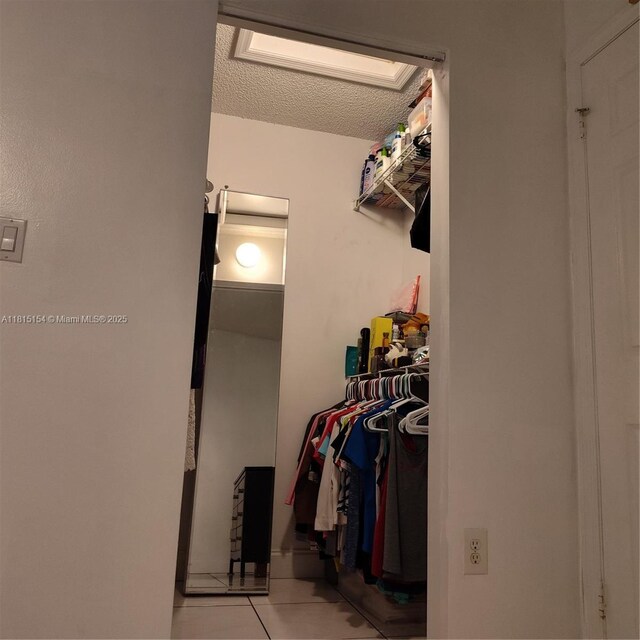 7486 SW 162nd Ct, Miami, FL 33193 - spacious closet with light tile patterned floors