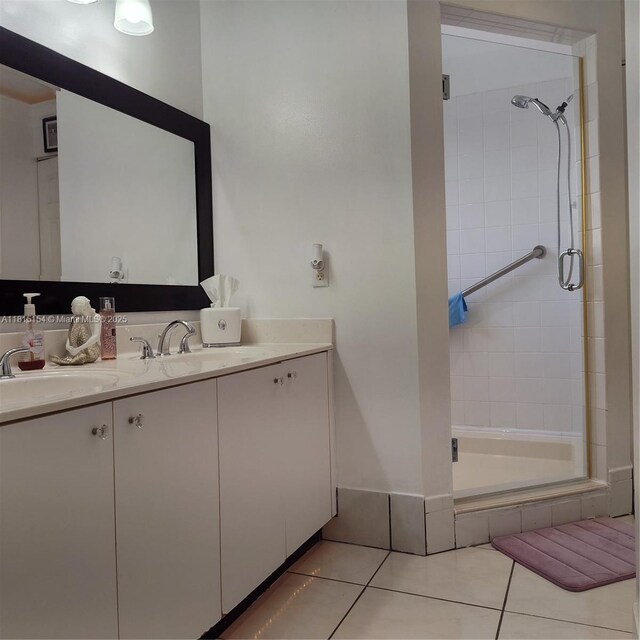 7486 SW 162nd Ct, Miami, FL 33193 - full bathroom featuring double vanity, tile patterned flooring, and a shower stall