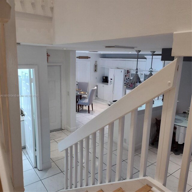 7486 SW 162nd Ct, Miami, FL 33193 - stairway featuring tile patterned flooring
