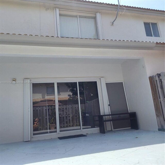 7486 SW 162nd Ct, Miami, FL 33193 - property entrance featuring stucco siding