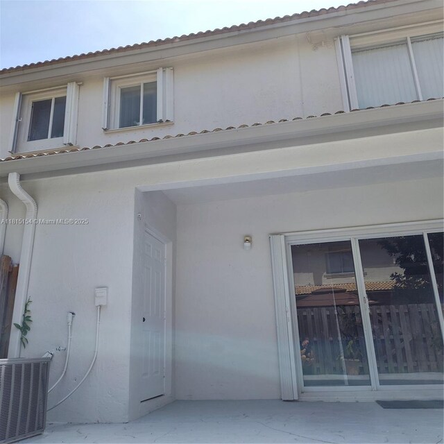 7486 SW 162nd Ct, Miami, FL 33193 - rear view of property with stucco siding