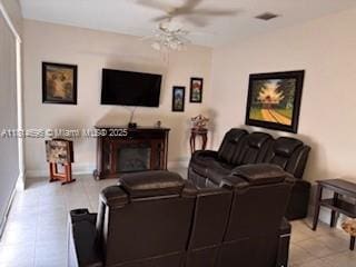 16362 SW 23rd St, Miramar, FL 33027 - living area featuring a ceiling fan, light tile patterned floors, and baseboards