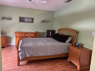 16362 SW 23rd St, Miramar, FL 33027 - bedroom featuring wood finished floors and a ceiling fan