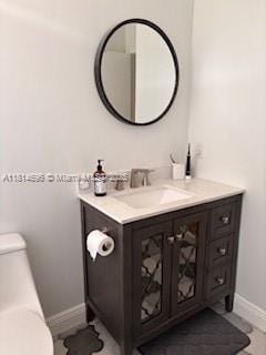 16362 SW 23rd St, Miramar, FL 33027 - half bath with toilet, vanity, and baseboards