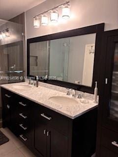 16362 SW 23rd St, Miramar, FL 33027 - full bath featuring double vanity and tile patterned floors